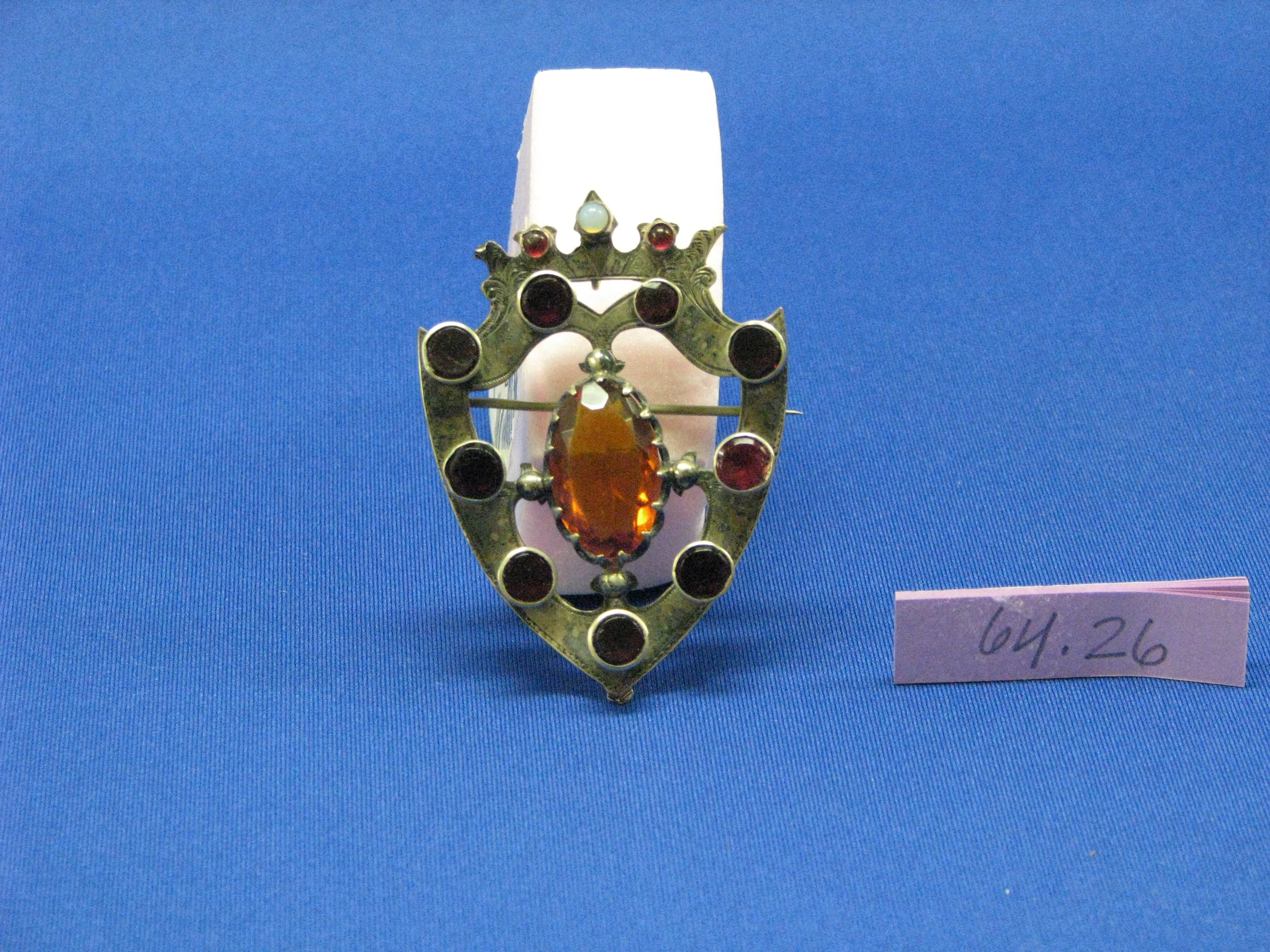 a%209%20gemmed%20Luckenbooth%20brooch%20with%20a%20topaz%20gem%20in%20the%20middle
